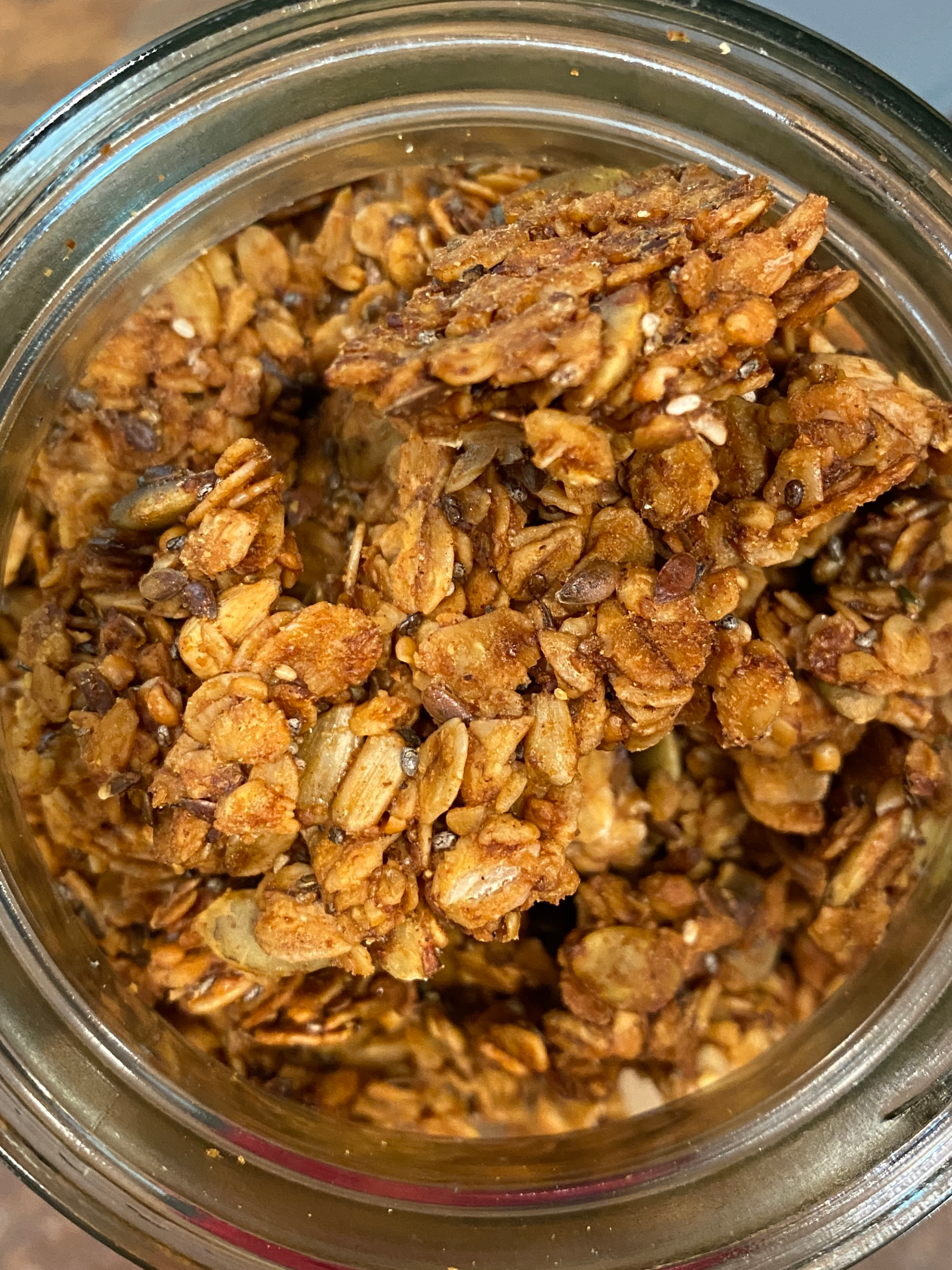sourdough discard granola in a glass jar.